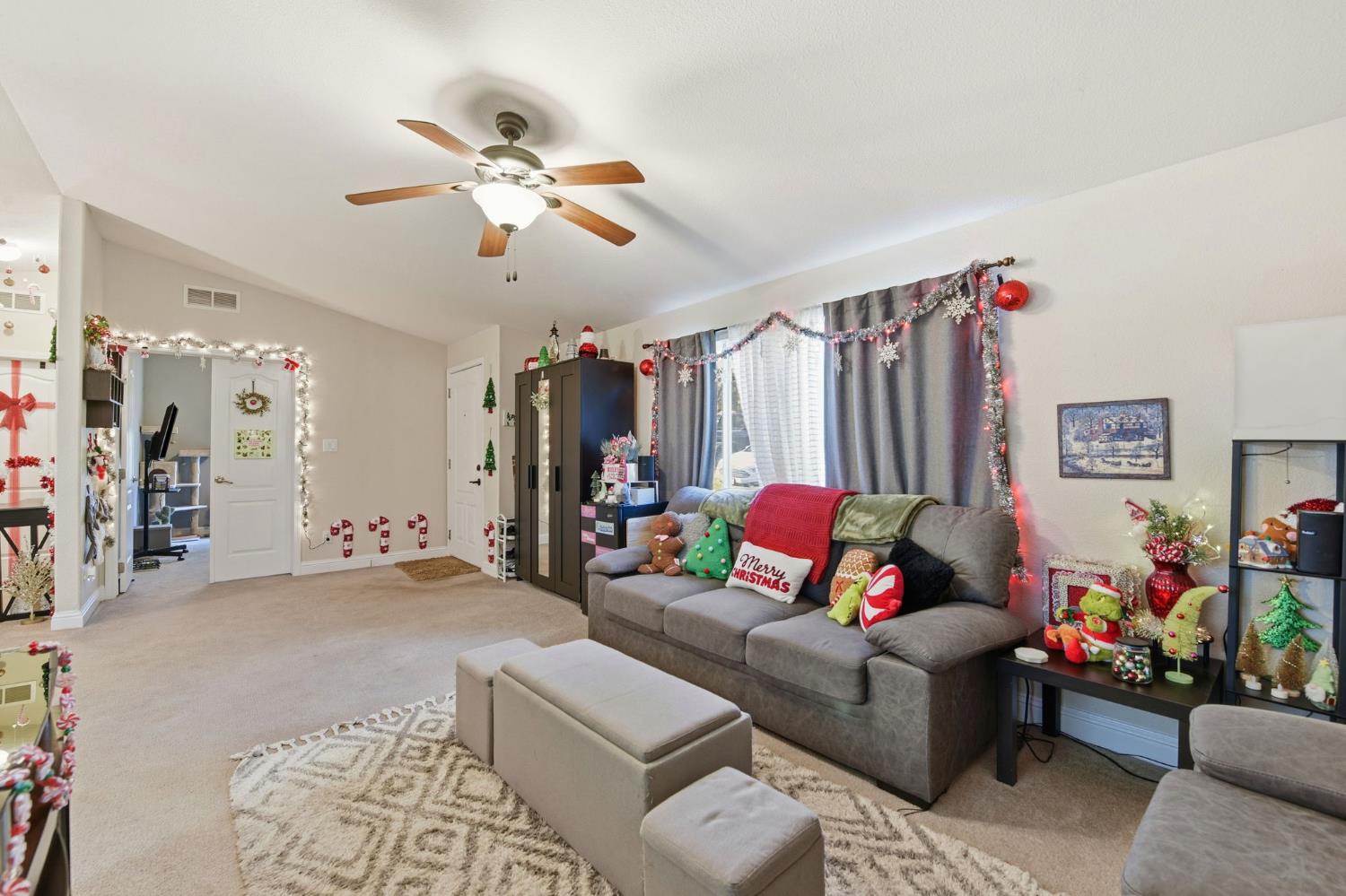 1160 Pleasant Valley Road Diamond Springs, CA 95619 - Photo 6 of 42 a living room with furniture and a chandelier