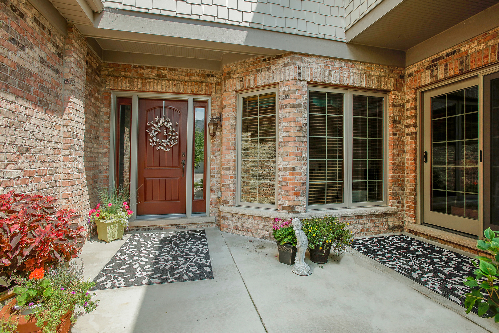 1015 Mackenzie Place Wheaton, IL 60187 - Photo 2 of 26 a front view of a building