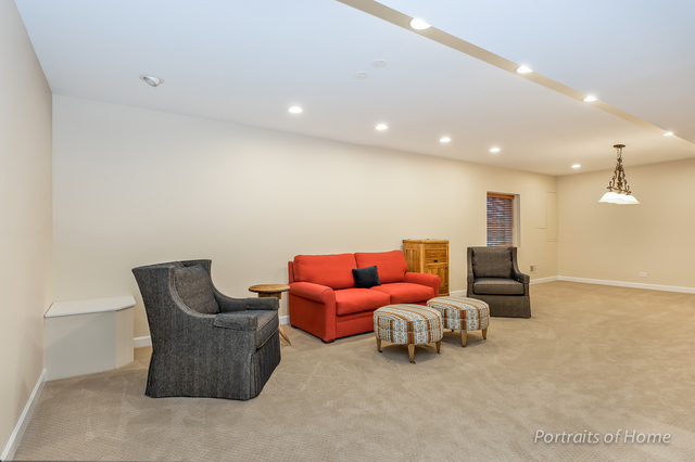 1015 Mackenzie Place Wheaton, IL 60187 - Photo 21 of 26 a living room with furniture