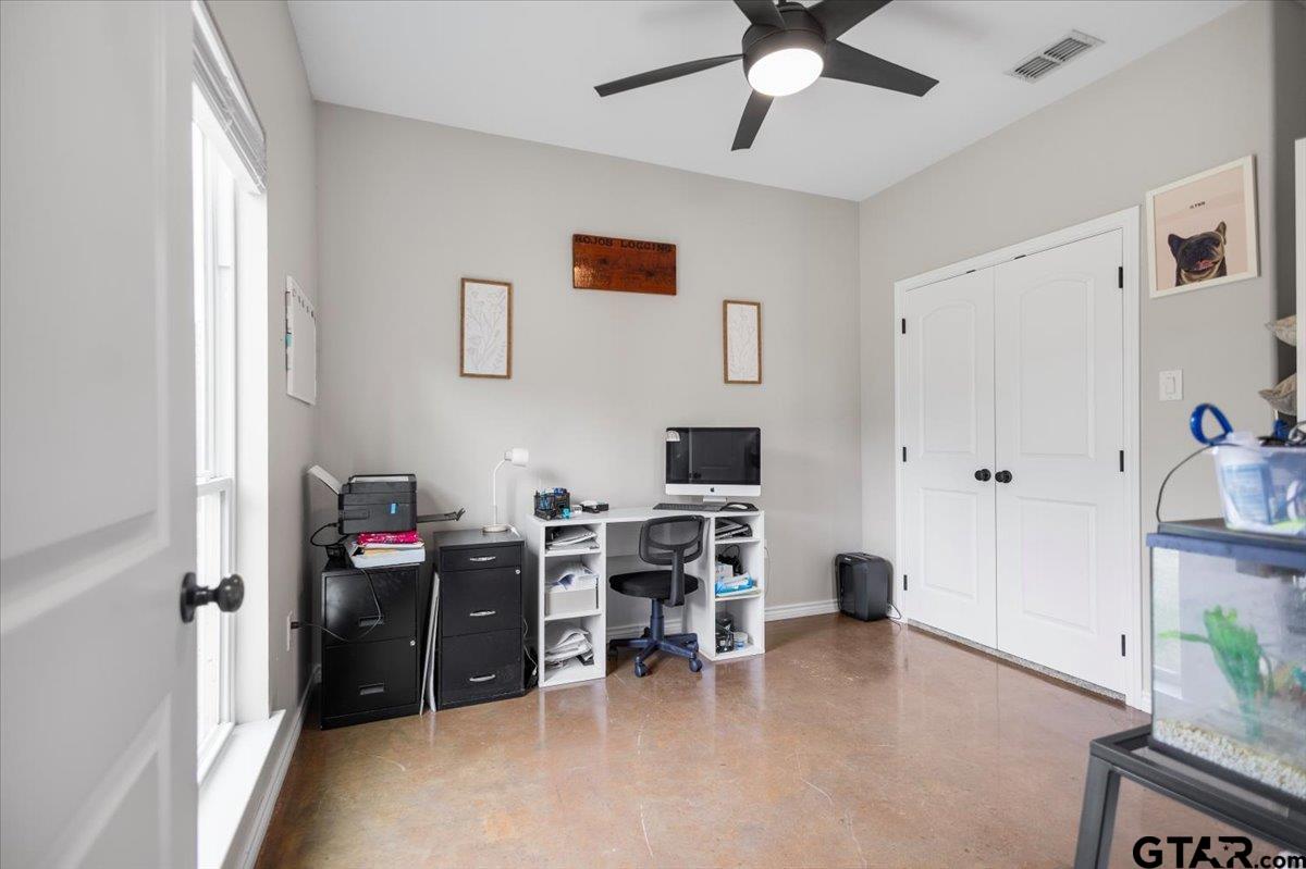 9235 Farm To Market Road 851 Rusk, TX 75785 - Photo 28 of 47 a view of a workspace with furniture and a window
