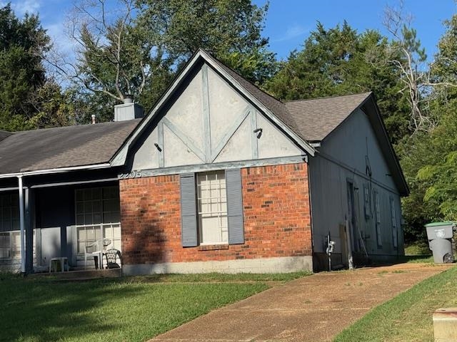 2205 Oldfield Drive Memphis, TN 38134 - Photo 3 of 4 a view of a house with a yard