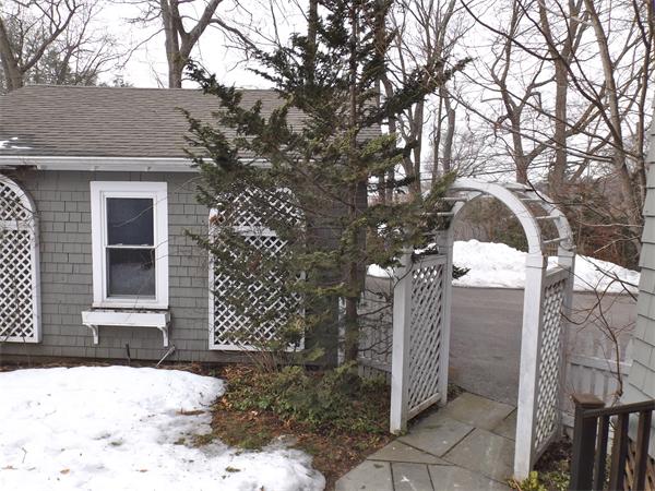 35 Ellison Road Newton, MA 02459 - Photo 17 of 22 a view of a house with a snow in the yard