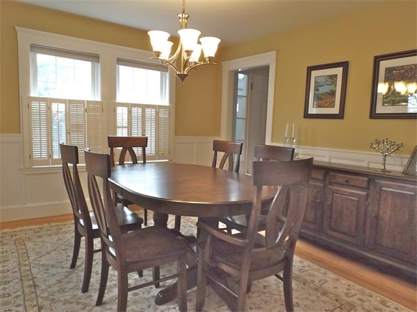 35 Ellison Road Newton, MA 02459 - Photo 6 of 22 a view of a dining room with furniture a chandelier and wooden floor
