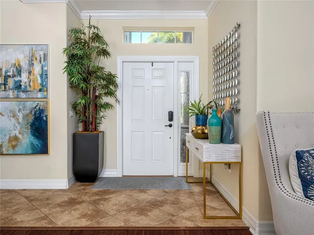 a view of an entryway with wooden floor