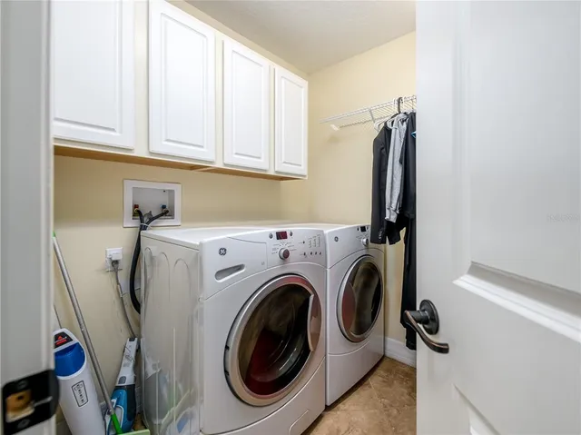 a view of kitchen with a sink and wooden floor