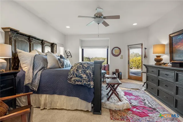 a living room with furniture rug and window