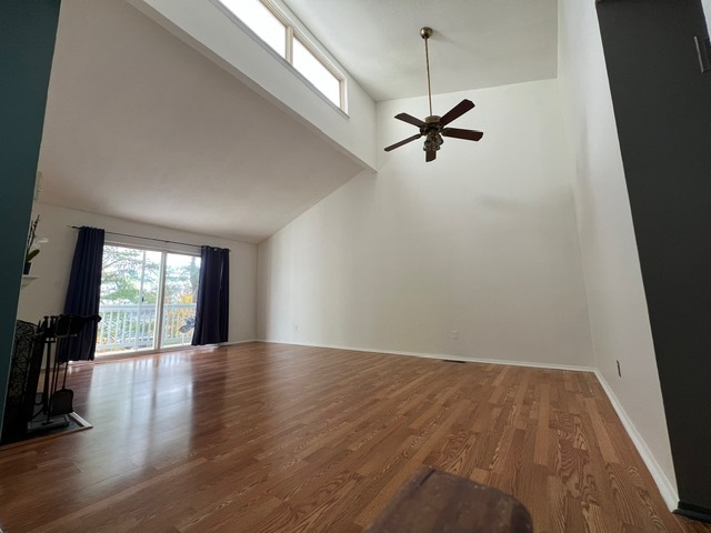 7 Pheasant Run, Unit 7 Cromwell, CT 06416 - Photo 3 of 20 wooden floor in an empty room with a window
