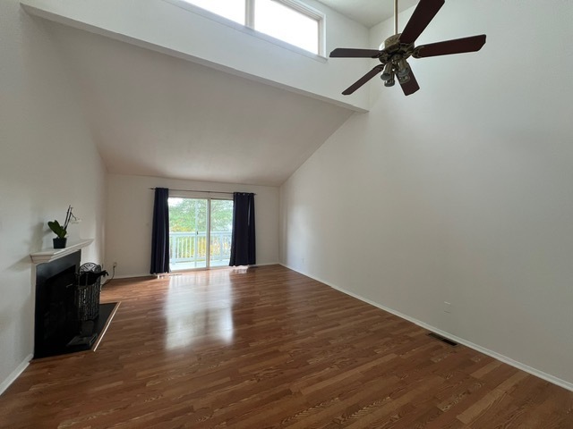 7 Pheasant Run, Unit 7 Cromwell, CT 06416 - Photo 4 of 20 wooden floor in an empty room with a window