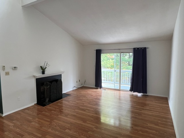 7 Pheasant Run, Unit 7 Cromwell, CT 06416 - Photo 5 of 20 a view of a room with wooden floor and a window