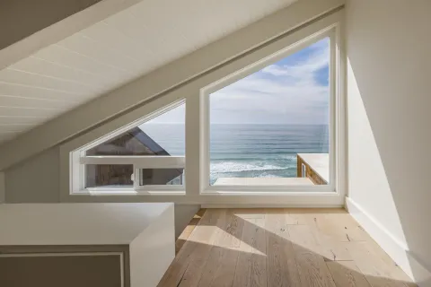 a bathroom with a granite countertop tub sink and shower