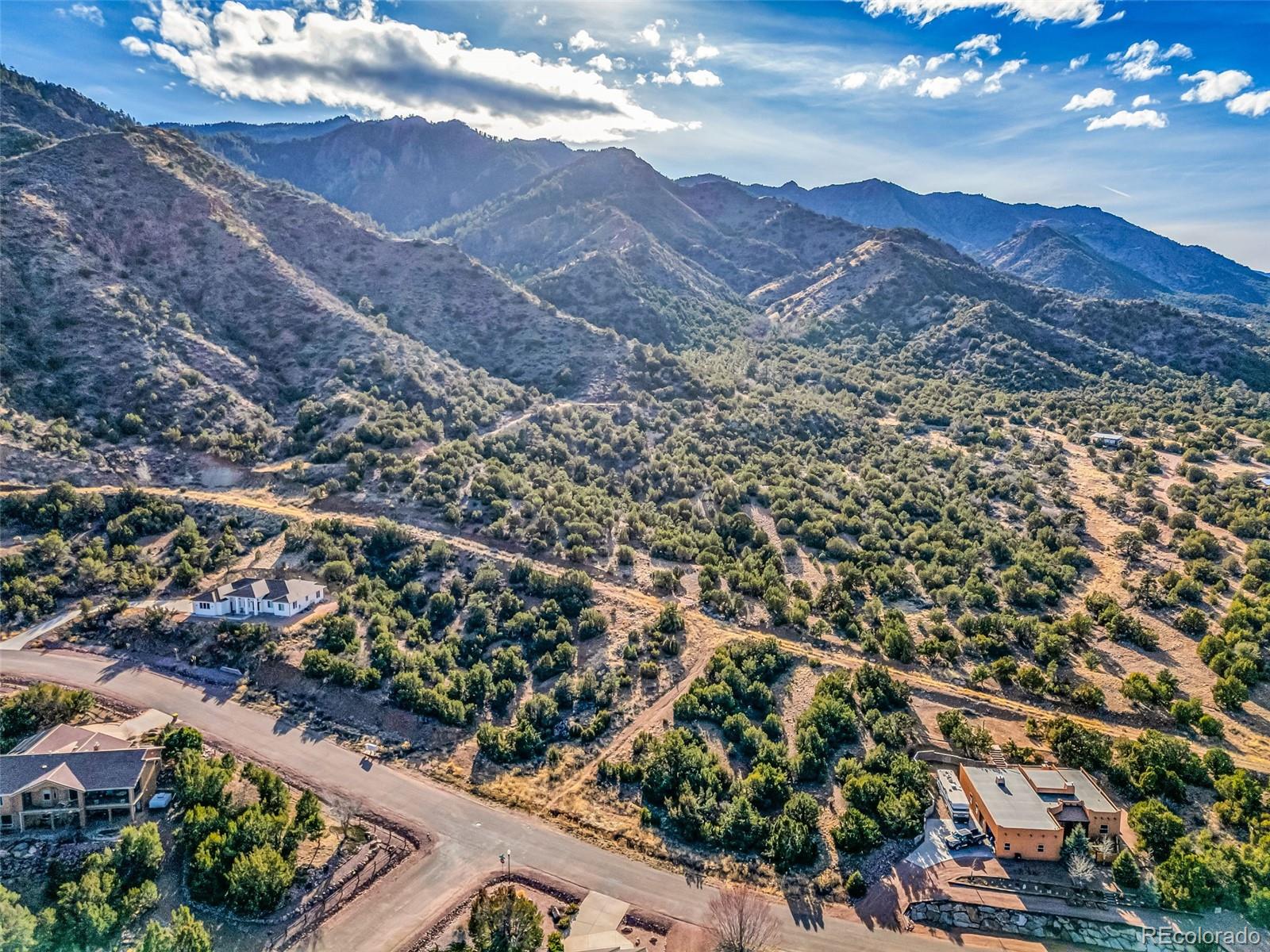 333 Storm Ridge Drive Canon City, CO 81212 - Photo 4 of 9 a view of a city with mountains in the background