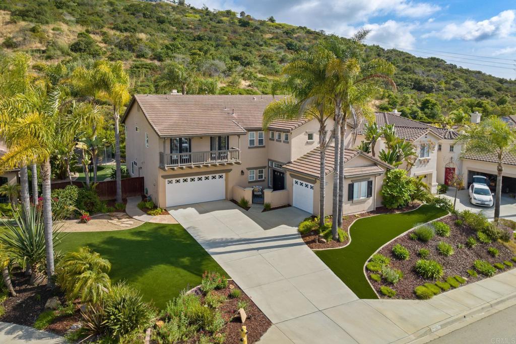 2107 Sun Valley Road San Marcos, CA 92078 - Photo 1 of 41 a view of a house with a garden and pathway