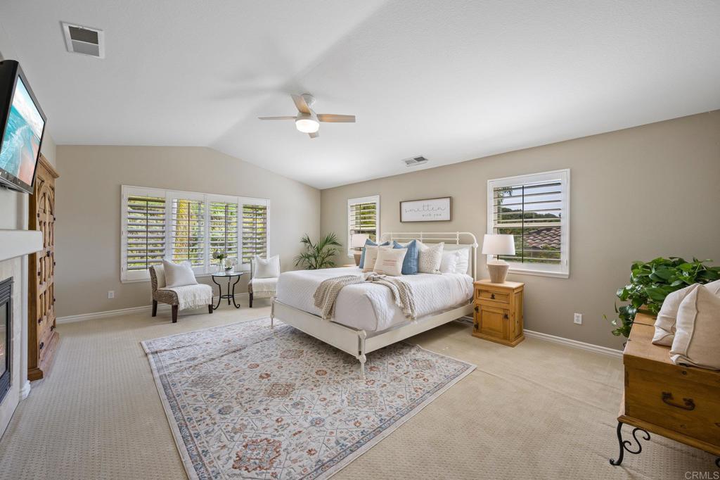 2107 Sun Valley Road San Marcos, CA 92078 - Photo 23 of 41 a bedroom with bed couch and window