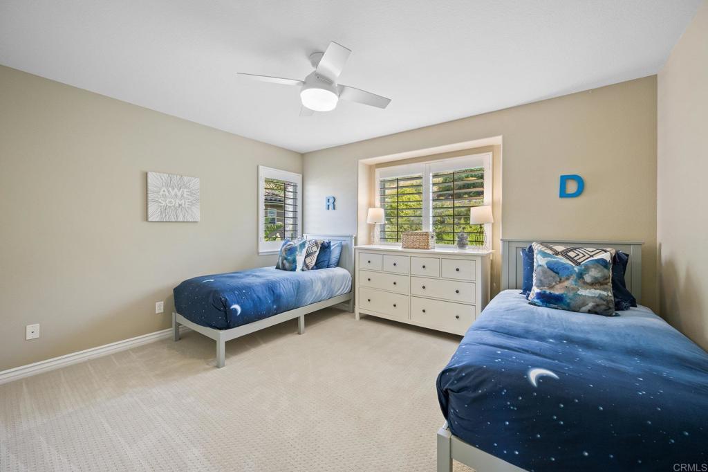 2107 Sun Valley Road San Marcos, CA 92078 - Photo 30 of 41 a bedroom with a bed and a window