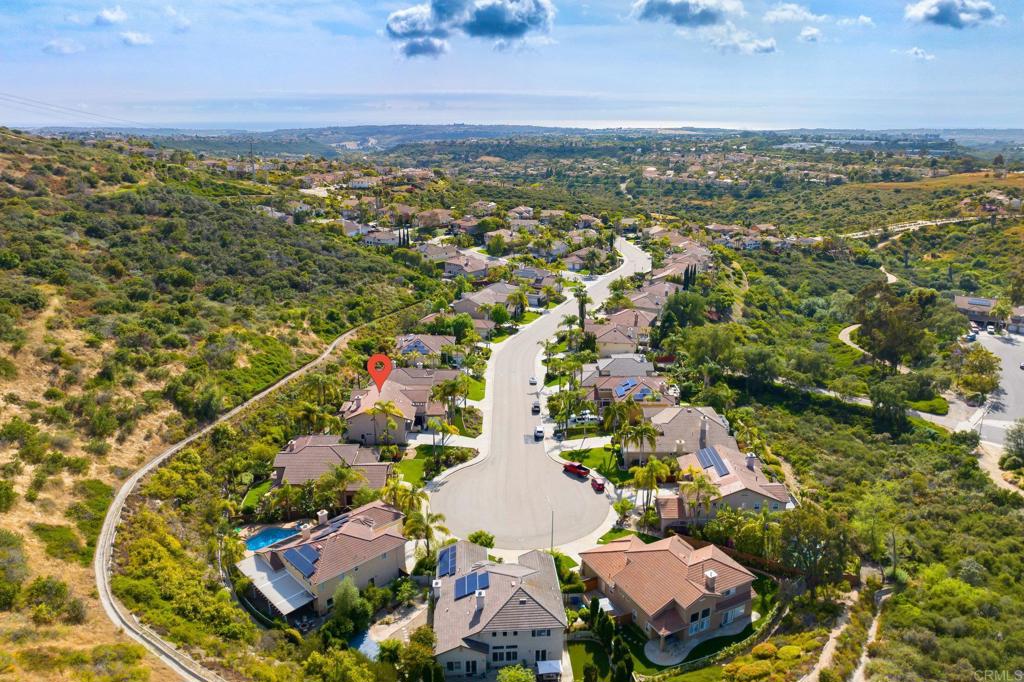2107 Sun Valley Road San Marcos, CA 92078 - Photo 37 of 41 an aerial view of residential houses with outdoor space and trees