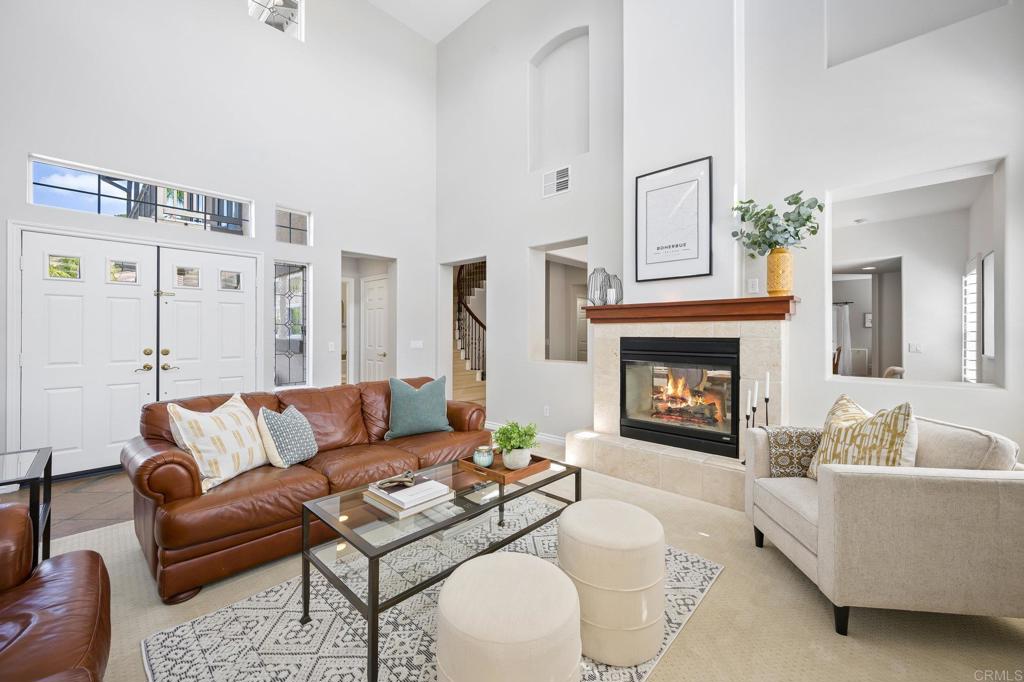 2107 Sun Valley Road San Marcos, CA 92078 - Photo 4 of 41 a living room with furniture and a fireplace
