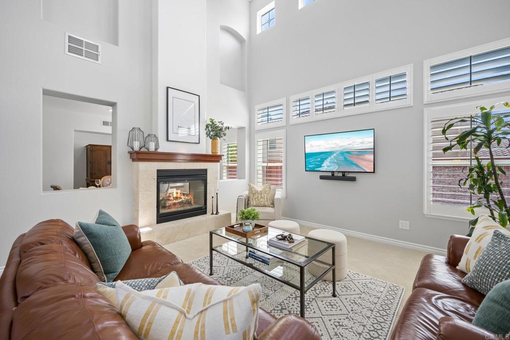 2107 Sun Valley Road San Marcos, CA 92078 - Photo 5 of 41 a living room with furniture and a fireplace