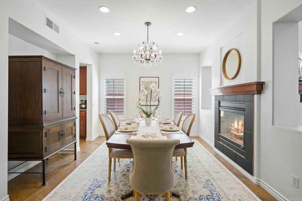 2107 Sun Valley Road San Marcos, CA 92078 - Photo 7 of 41 a view of a dining room with furniture window and wooden floor