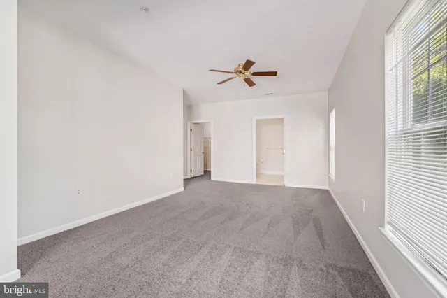 a view of empty room with a window