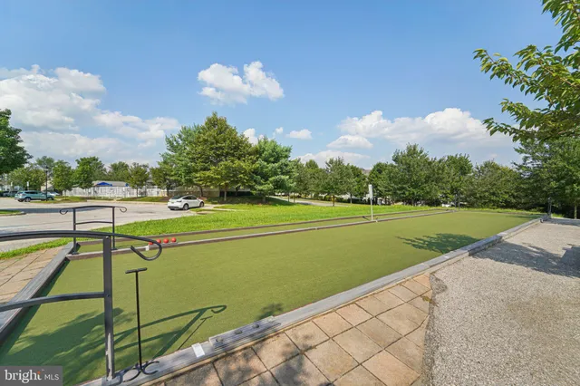a view of swimming pool with a garden
