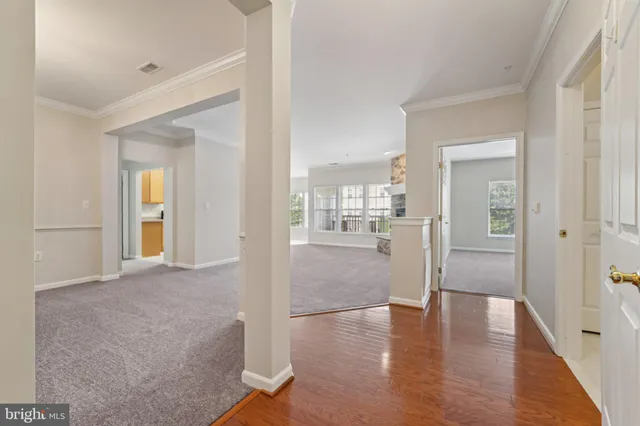 a view of livingroom with hardwood floor and hallway
