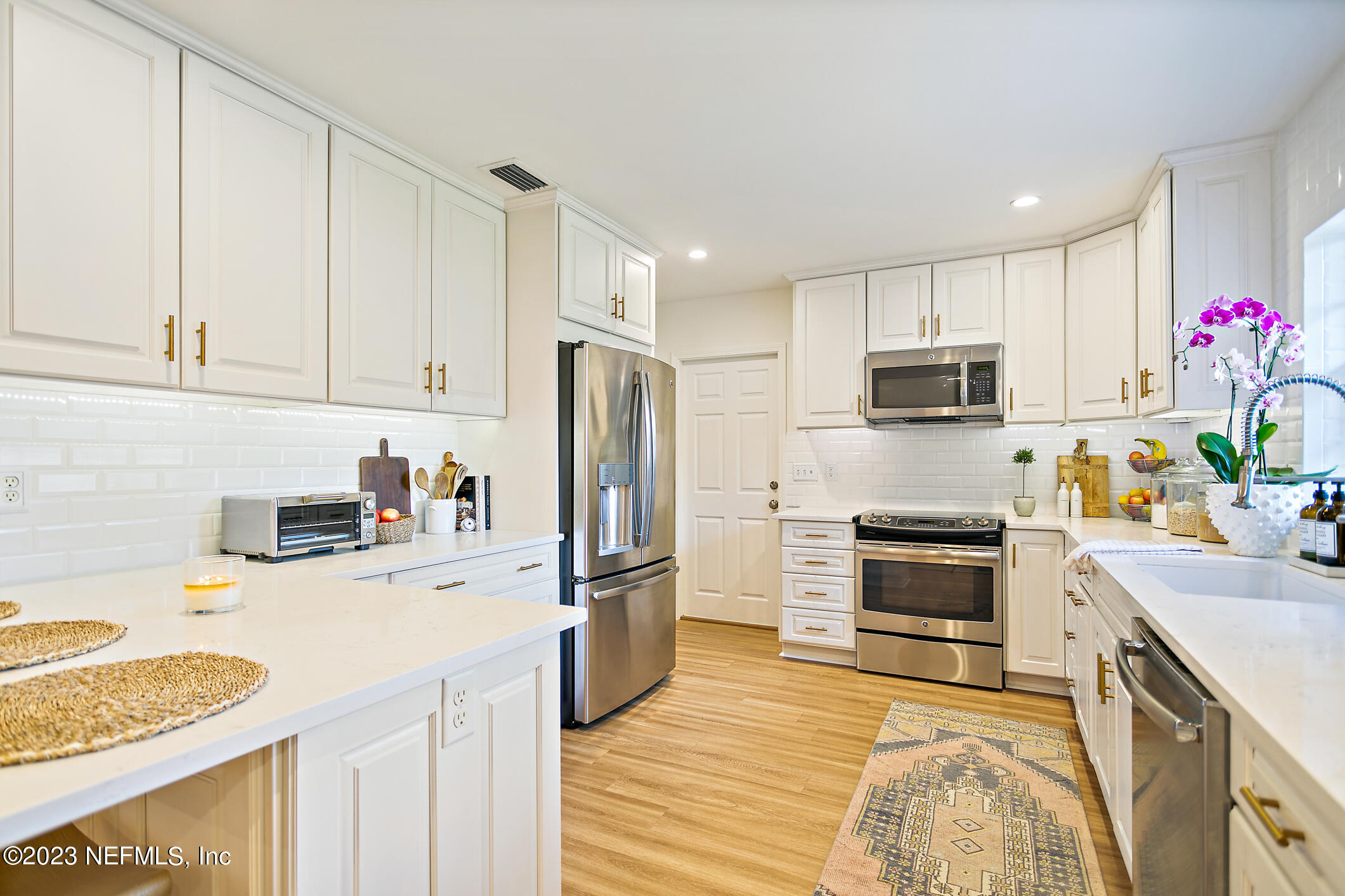 4717 Carlisle Road Jacksonville, FL 32210 - Photo 14 of 46 Modern White Kitchen