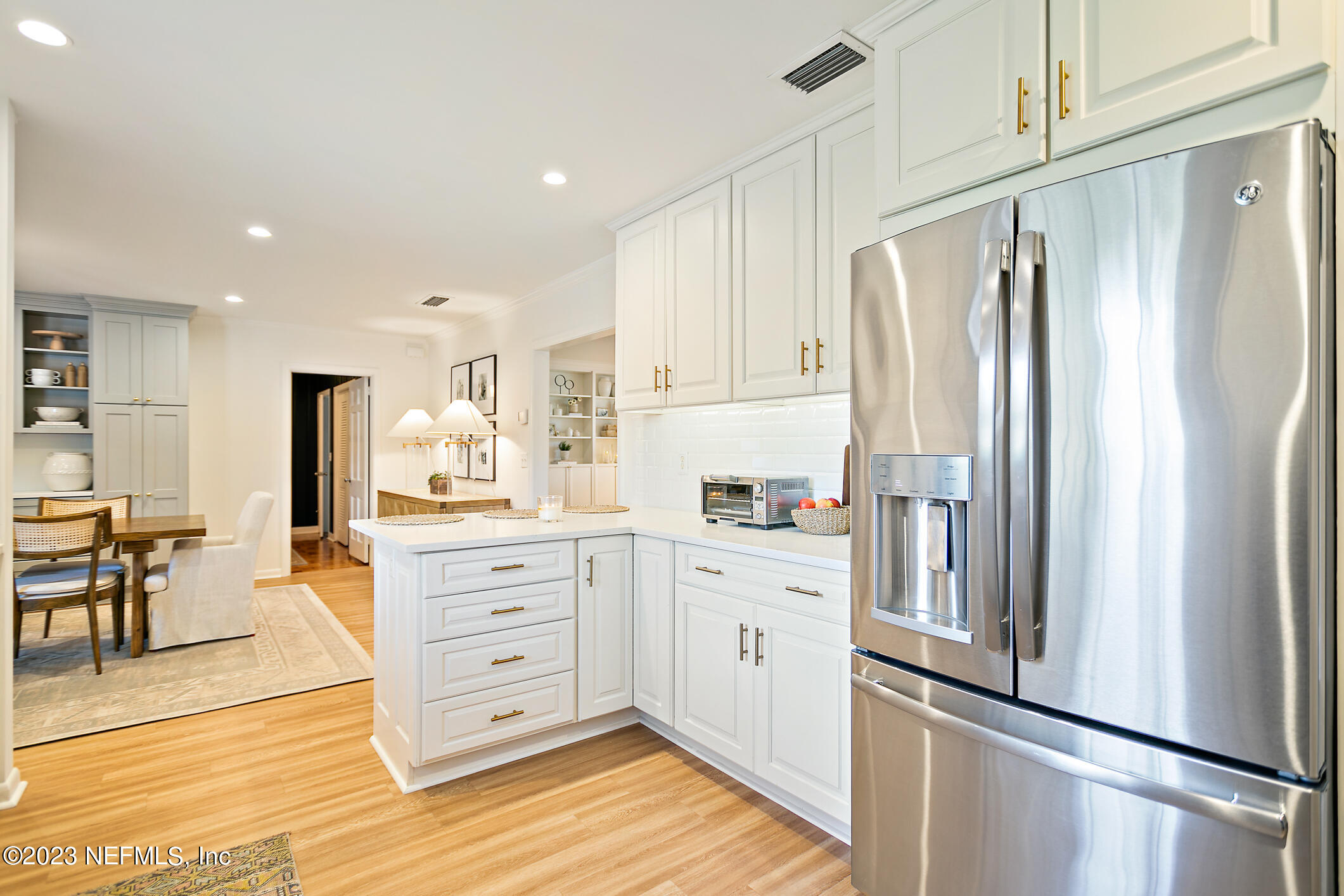 4717 Carlisle Road Jacksonville, FL 32210 - Photo 16 of 46 Kitchen into the Family/Dining Room