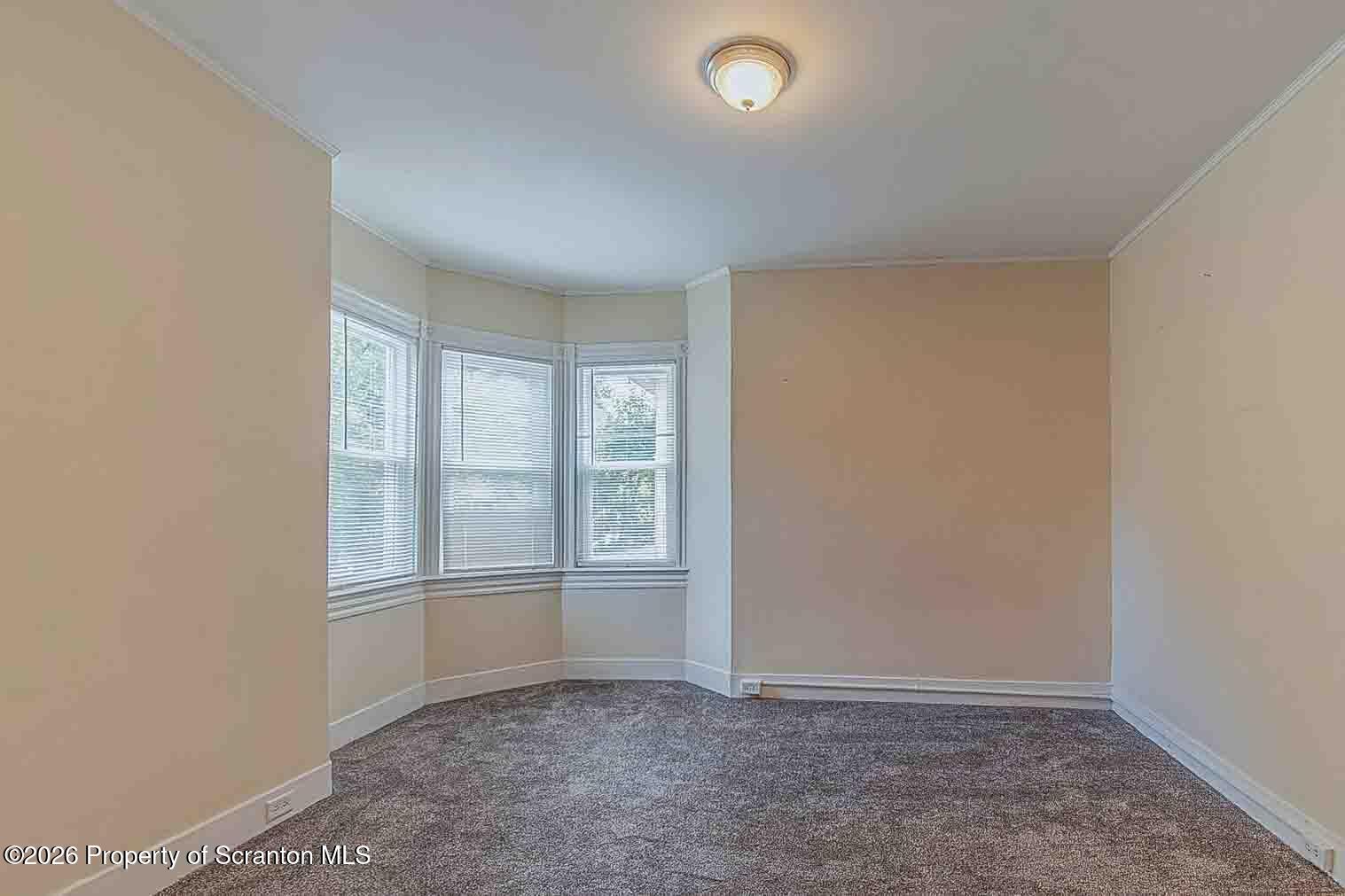 815 Monroe Avenue Scranton, PA 18510 - Photo 15 of 22 an empty room with windows