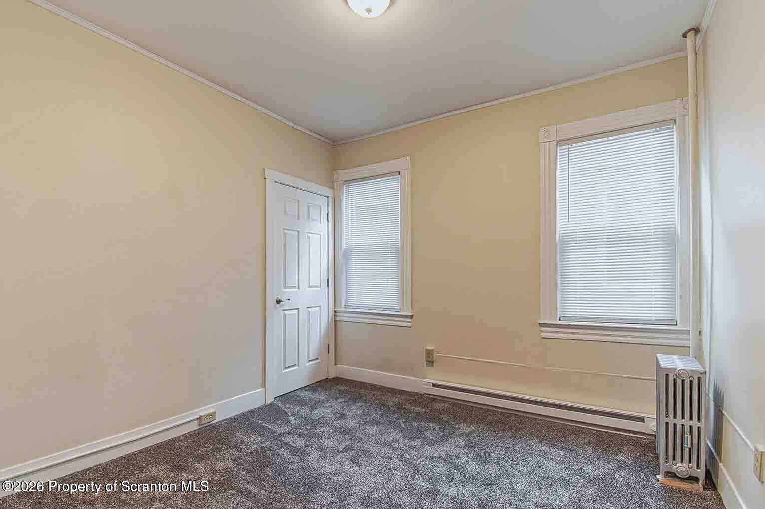 815 Monroe Avenue Scranton, PA 18510 - Photo 16 of 22 an empty room with windows