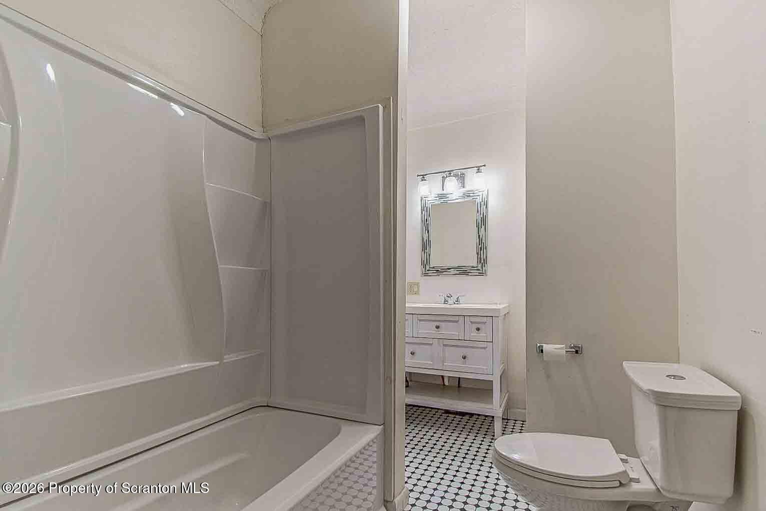 815 Monroe Avenue Scranton, PA 18510 - Photo 20 of 22 a bathroom with a toilet a sink and a shower
