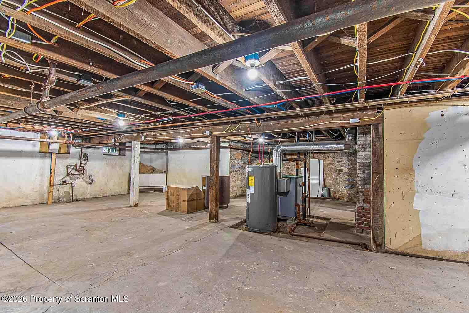 815 Monroe Avenue Scranton, PA 18510 - Photo 22 of 22 a view of an empty room with wooden roof