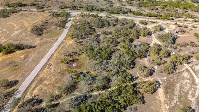 an aerial view of residential building and ocean