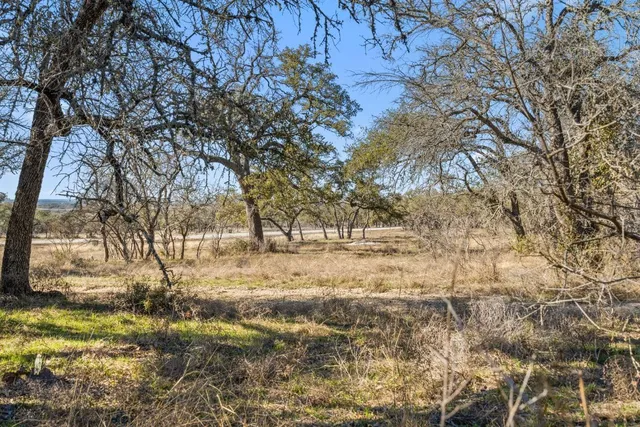 a view of yard covered with snow in outdoor