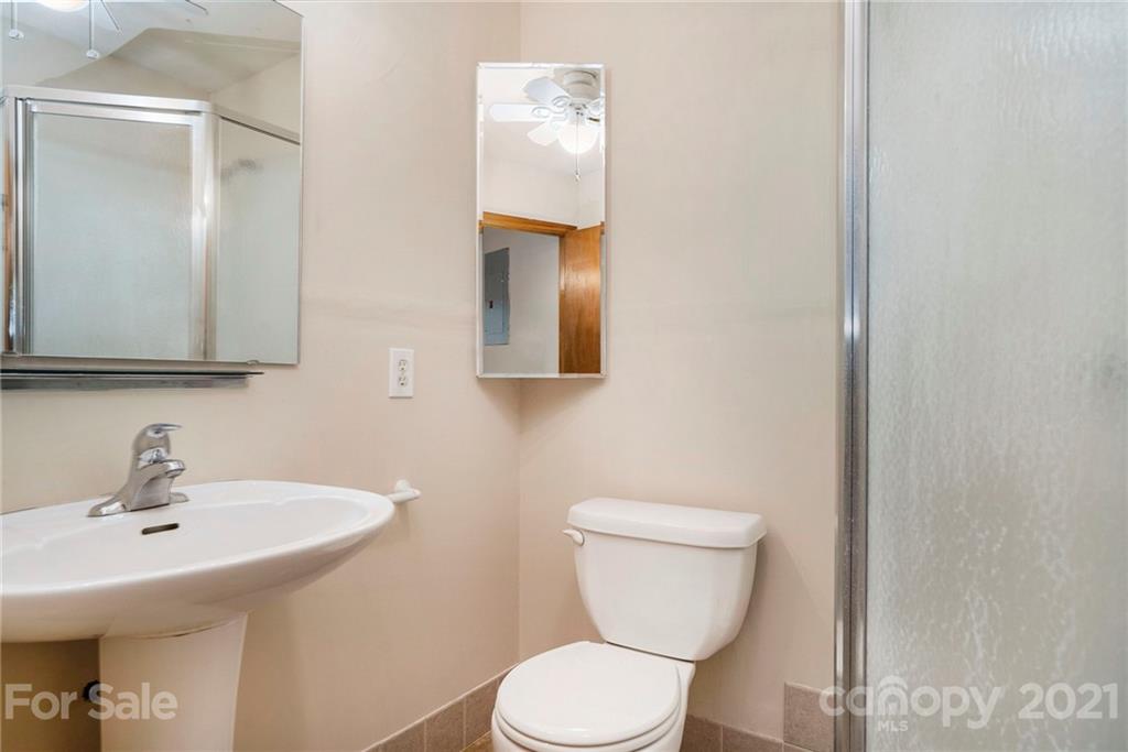 2269 Patterson Road Clover, SC 29710 - Photo 6 of 20 a bathroom with a toilet sink and mirror