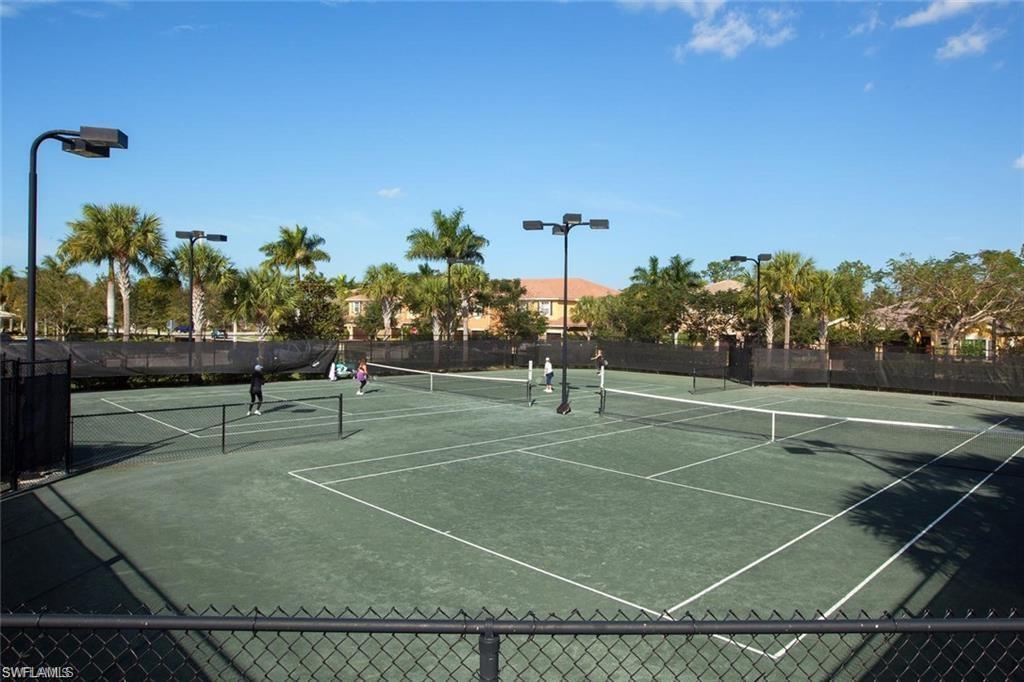 6522 Monterey Point, Unit 101 Naples, FL 34105 - Photo 23 of 29 a view of a tennis court
