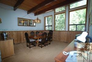 24620 Upper Rim Rock Road Idyllwild, CA 92549 - Photo 8 of 16 a view of a livingroom with furniture