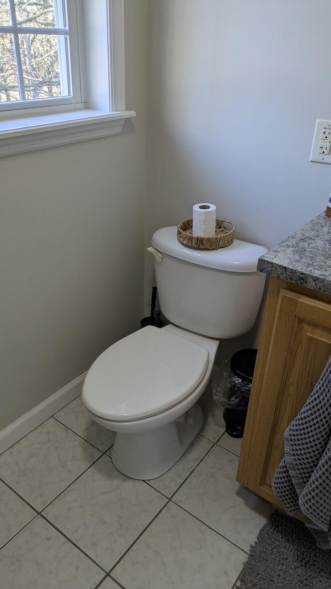 82 Old Orchard Road Eastham, MA 02642 - Photo 13 of 22 a white toilet sitting next to a window
