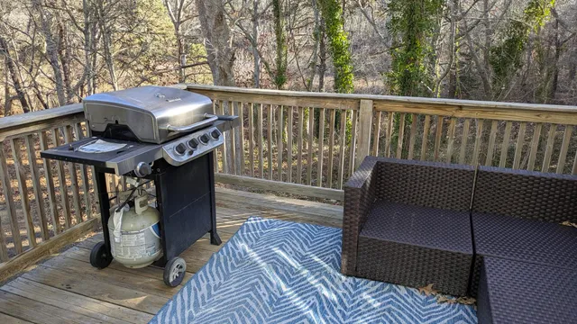 a view of balcony with wooden floor