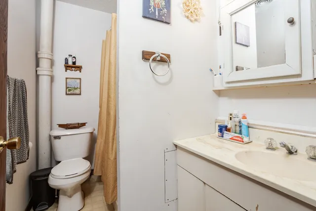 a room with furniture and gym equipment