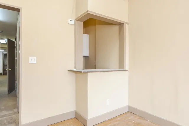 a bathroom with a sink a mirror and vanity