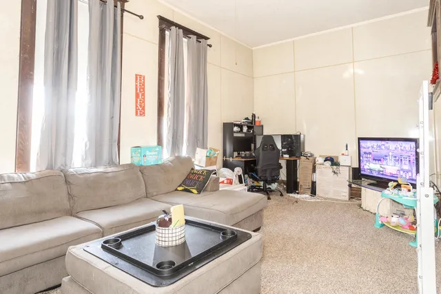 a bathroom with a sink toilet and a mirror