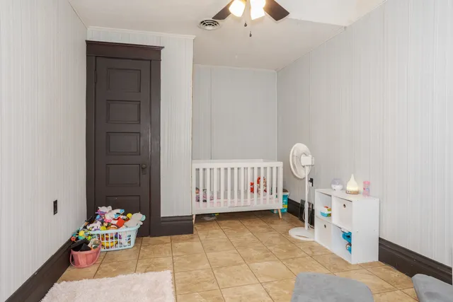 a kitchen with sink refrigerator and window
