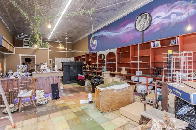 a view of a chairs and tables in patio