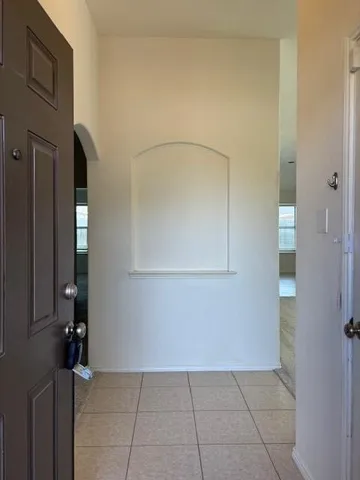 a view of a livingroom with a flat screen tv