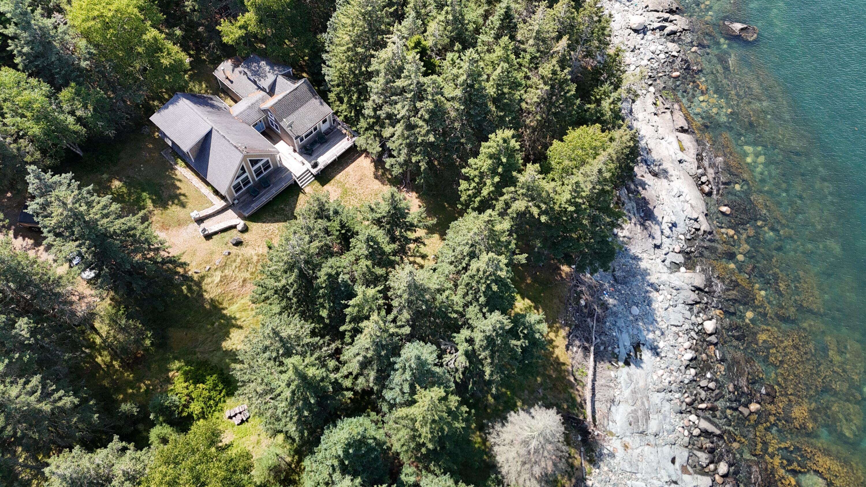 142 East Point Road Swans Island, ME 04685 - Photo 5 of 96 over top with beach