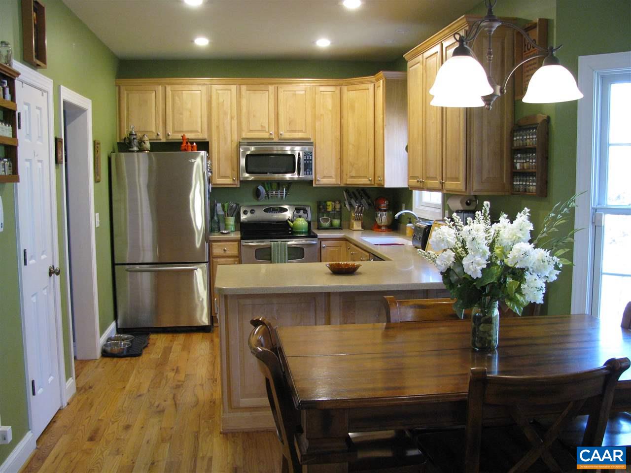 350 Spring Haven Lane Ruckersville, VA 22968 - Photo 12 of 50 a kitchen with stainless steel appliances a refrigerator a sink a stove and cabinets