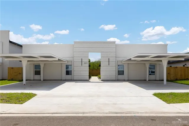 a view of a house with a garage and a garage