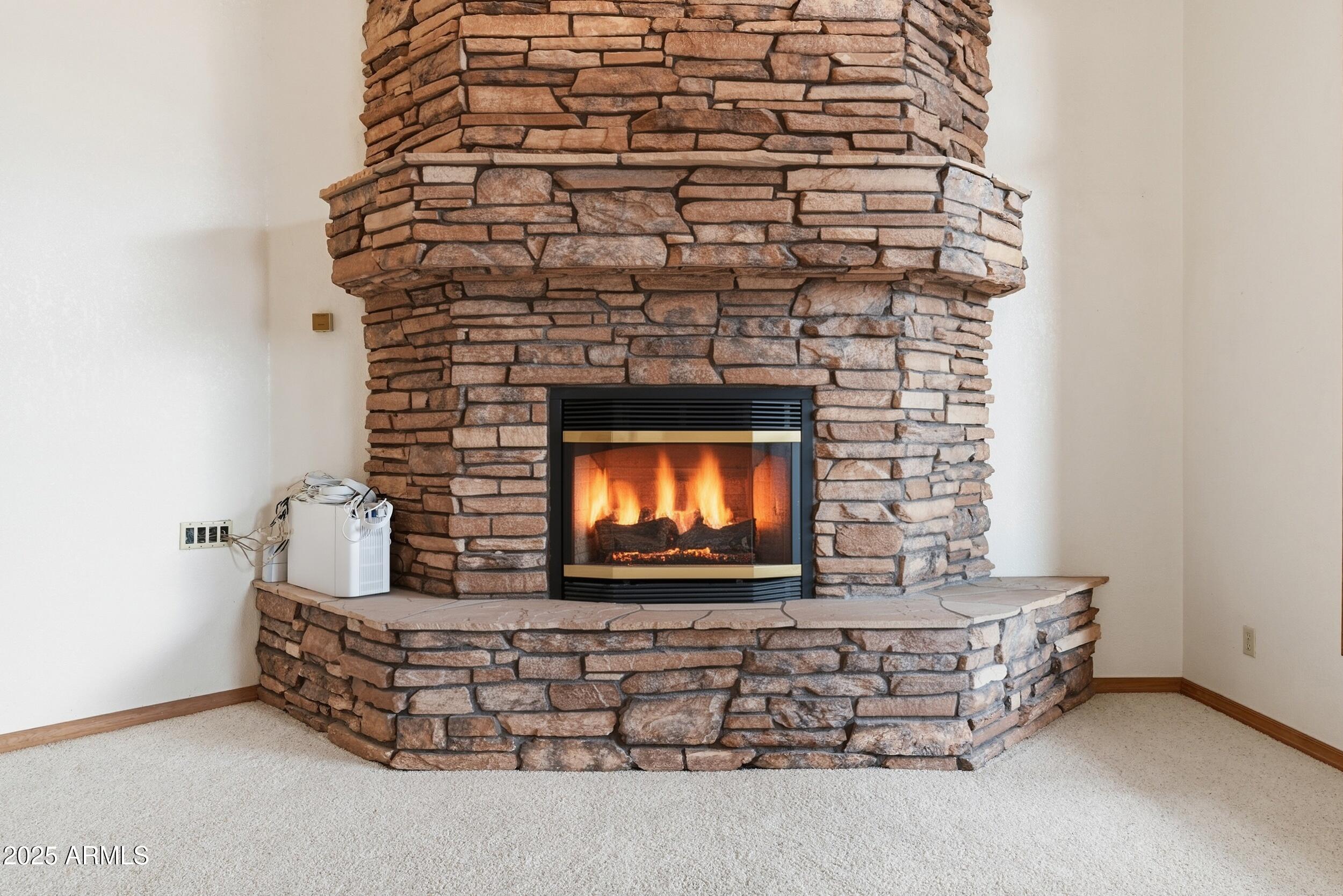 1606 Becky Circle Payson, AZ 85541 - Photo 11 of 58 a living room with furniture and a fireplace