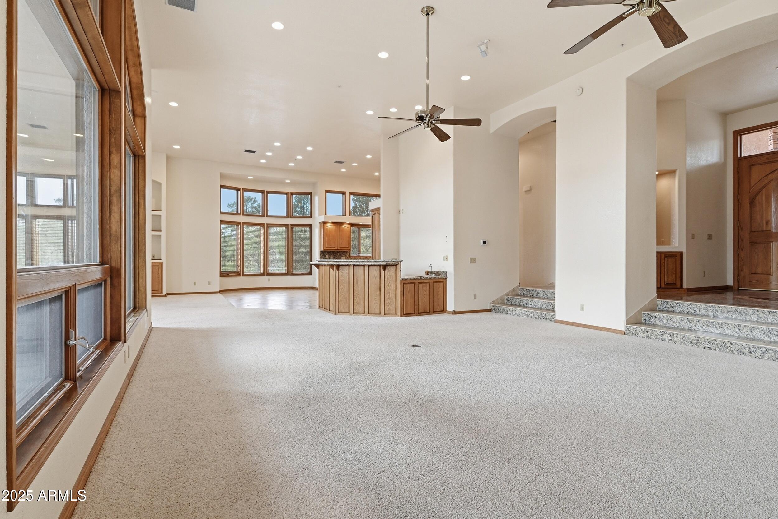 1606 Becky Circle Payson, AZ 85541 - Photo 12 of 58 an empty room with kitchen view and a sink