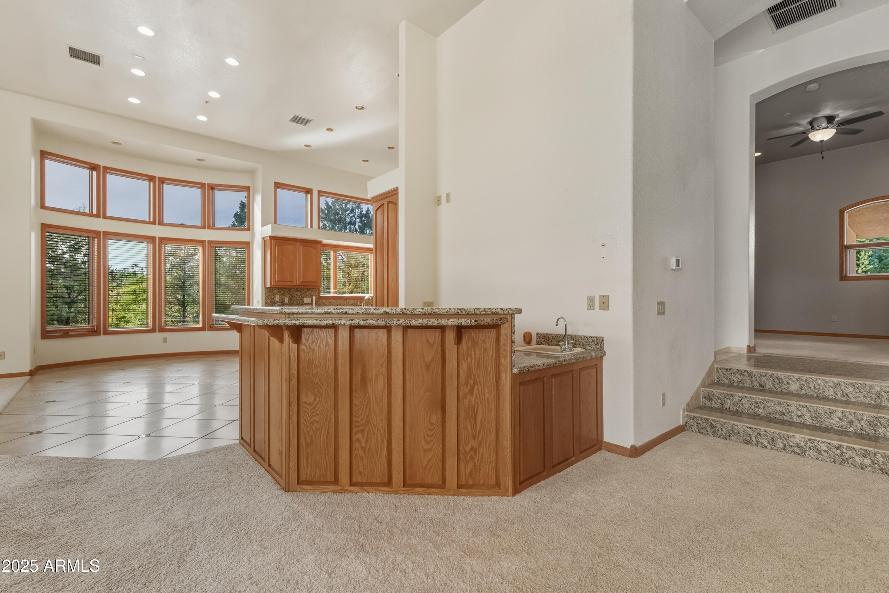 1606 Becky Circle Payson, AZ 85541 - Photo 13 of 58 wooden floor in an empty room with a window
